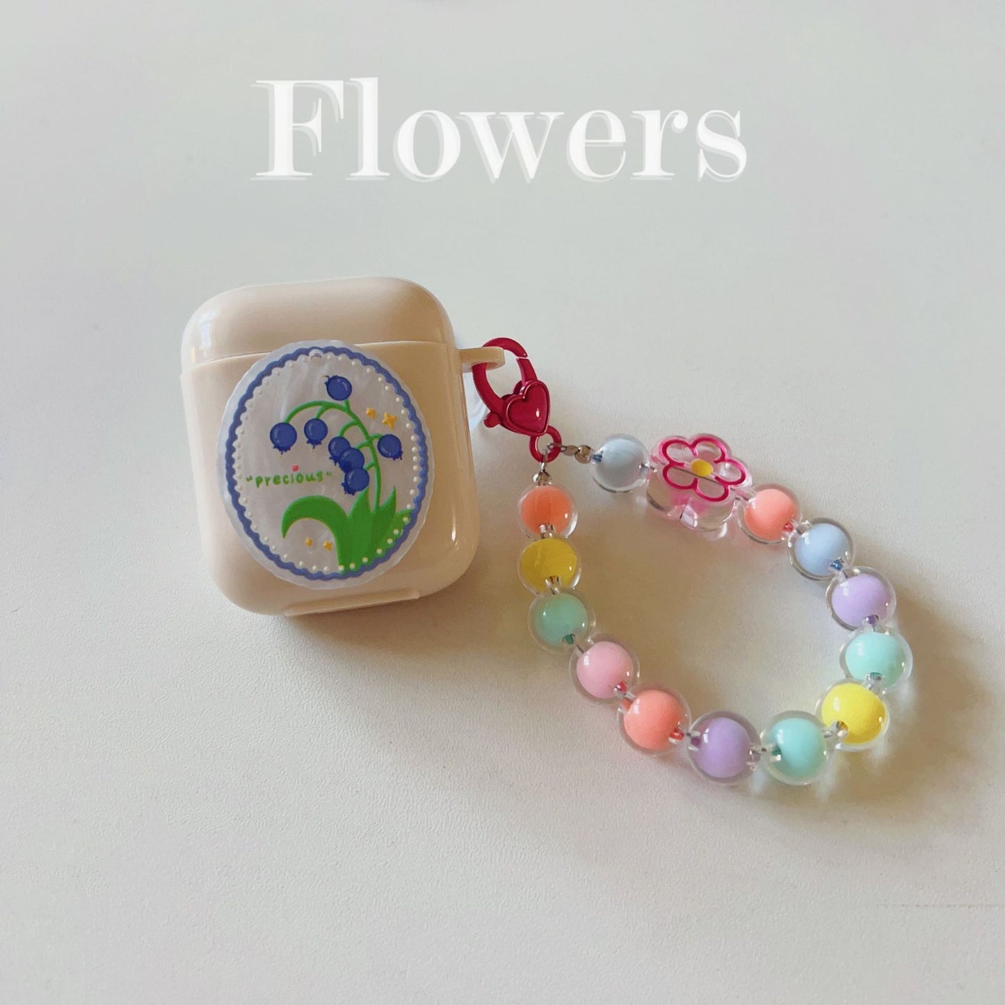 Floral patches + pink base shell + pink bracelet Apple AirPods Pro